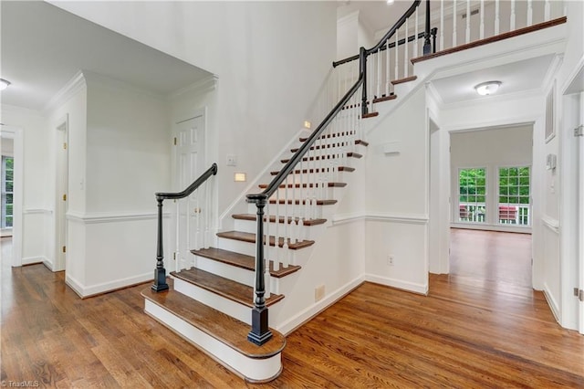 1807 Millhouse Ct, Greensboro, NC 27407 - stairs featuring wood finished floors and crown molding