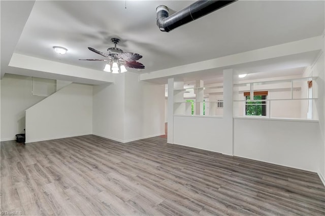 1807 Millhouse Ct, Greensboro, NC 27407 - unfurnished living room featuring wood finished floors and a ceiling fan