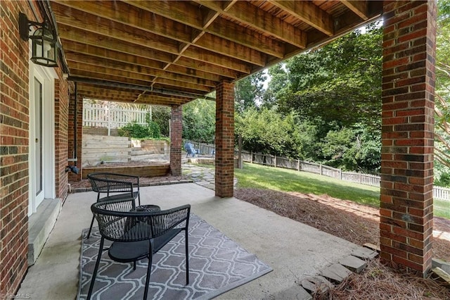 1807 Millhouse Ct, Greensboro, NC 27407 - fenced backyard with a patio area
