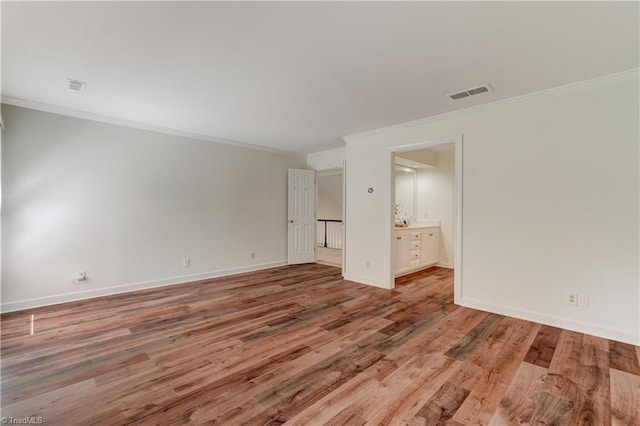 1807 Millhouse Ct, Greensboro, NC 27407 - unfurnished room with light wood finished floors and ornamental molding