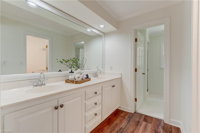 1807 Millhouse Ct, Greensboro, NC 27407 - full bathroom with wood finished floors, double vanity, and ornamental molding