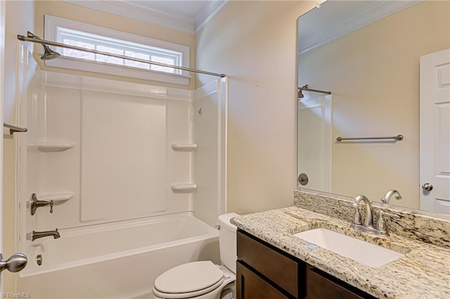 bathroom featuring crown molding, vanity, toilet, and shower / bathing tub combination