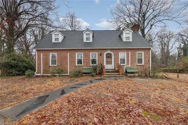 view of new england style home