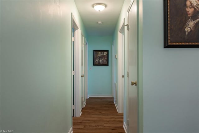 corridor featuring hardwood / wood-style flooring