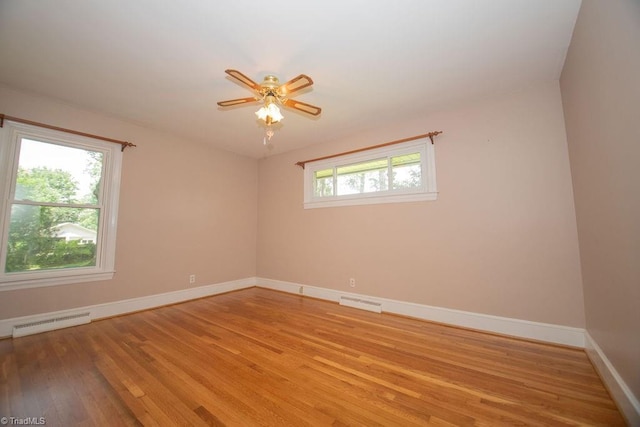 7040 Franklin Rd, Lewisville, NC 27023 - empty room with light wood-style flooring and ceiling fan