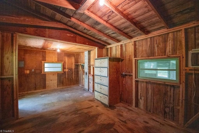 7040 Franklin Rd, Lewisville, NC 27023 - kitchen with lofted ceiling, wood walls, wooden ceiling, and brown cabinetry