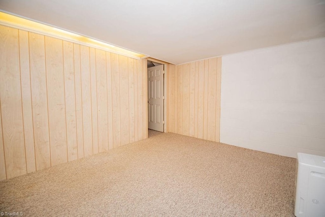 7040 Franklin Rd, Lewisville, NC 27023 - spare room with carpet floors and wooden walls
