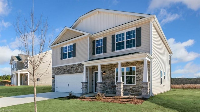 craftsman-style house with a front lawn, stone siding, a garage, and concrete driveway