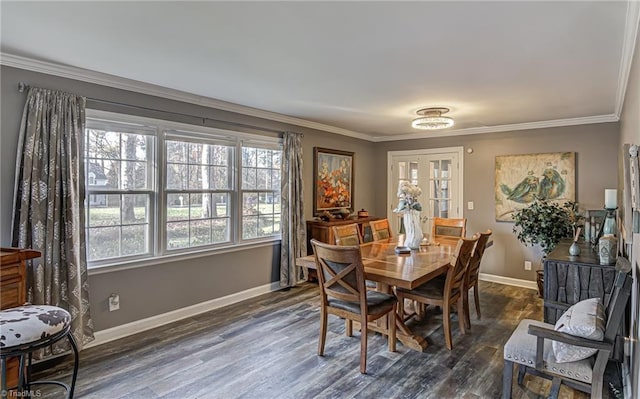 dining room featuring dark hardwood / wood-style floors and ornamental molding