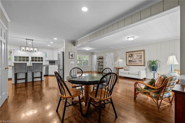 1732 Edgewood Ave, Burlington, NC 27215 - dining space featuring dark wood-style flooring, ornamental molding, and recessed lighting