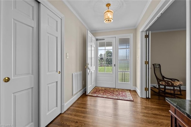 1732 Edgewood Ave, Burlington, NC 27215 - foyer entrance with dark wood-style flooring and ornamental molding