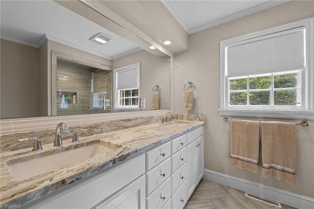 1732 Edgewood Ave, Burlington, NC 27215 - bathroom with double vanity, crown molding, a shower stall, and recessed lighting