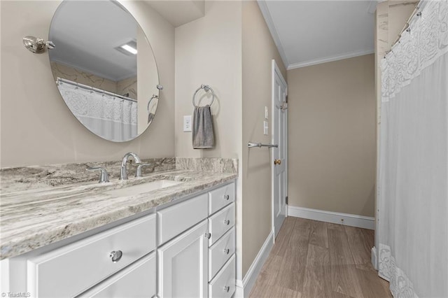 1732 Edgewood Ave, Burlington, NC 27215 - full bath with vanity, crown molding, and wood finished floors