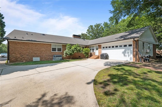 1732 Edgewood Ave, Burlington, NC 27215 - single story home with brick siding, an attached garage, concrete driveway, and a chimney