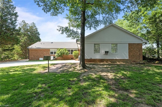 1732 Edgewood Ave, Burlington, NC 27215 - view of side of property featuring a lawn and brick siding