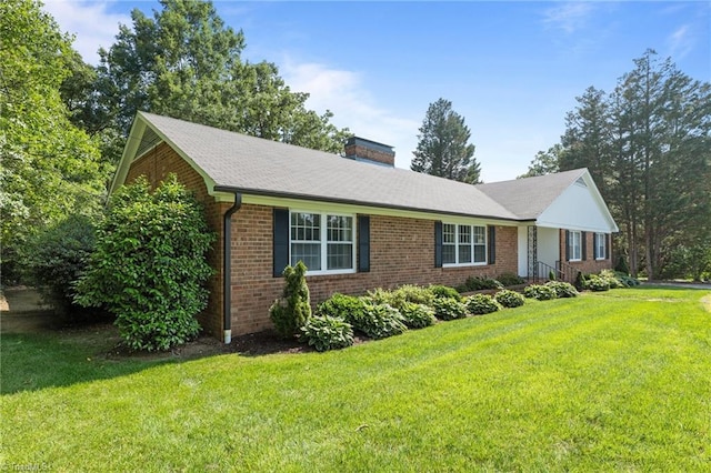 1732 Edgewood Ave, Burlington, NC 27215 - single story home featuring brick siding, a front lawn, and a chimney
