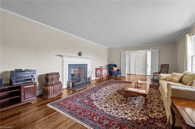 1732 Edgewood Ave, Burlington, NC 27215 - living area featuring wood finished floors and crown molding