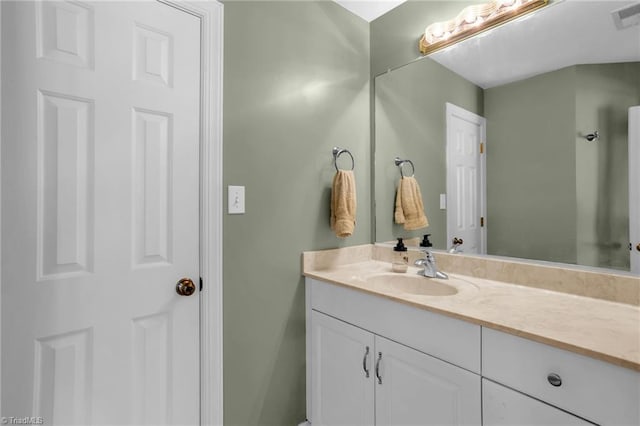 bathroom with visible vents and vanity