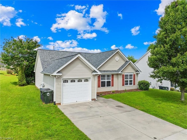 5803 Sycamore Glen Rd, Greensboro, NC 27405 - view of front of house featuring an attached garage, a shingled roof, concrete driveway, and a front yard