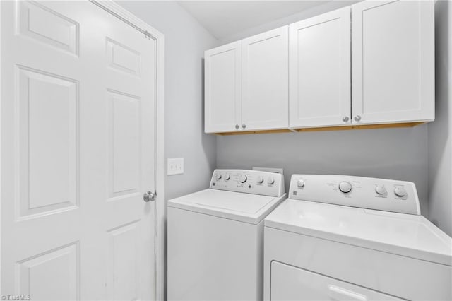 5803 Sycamore Glen Rd, Greensboro, NC 27405 - laundry room with cabinet space and washer and dryer
