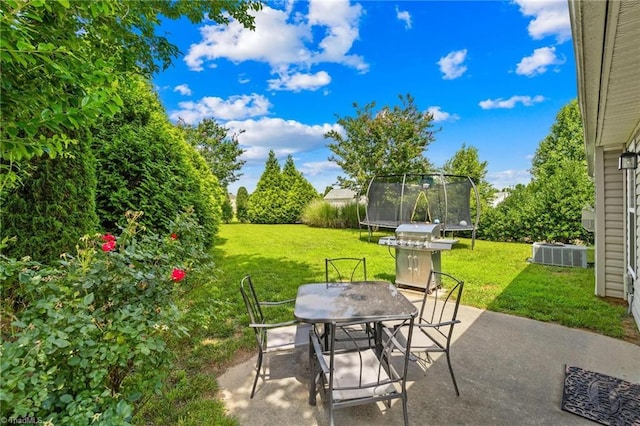 5803 Sycamore Glen Rd, Greensboro, NC 27405 - view of patio / terrace featuring a trampoline, area for grilling, and outdoor dining space