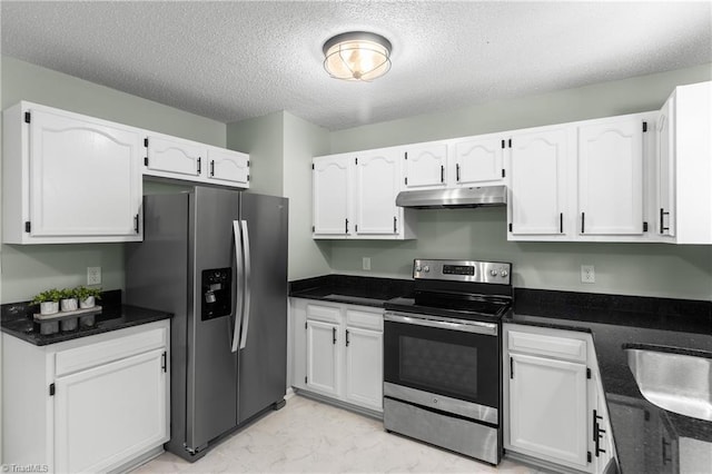 1650 Billy Dr, Winston-Salem, NC 27107 - kitchen featuring stainless steel appliances, under cabinet range hood, white cabinetry, light marble finish floors, and a textured ceiling