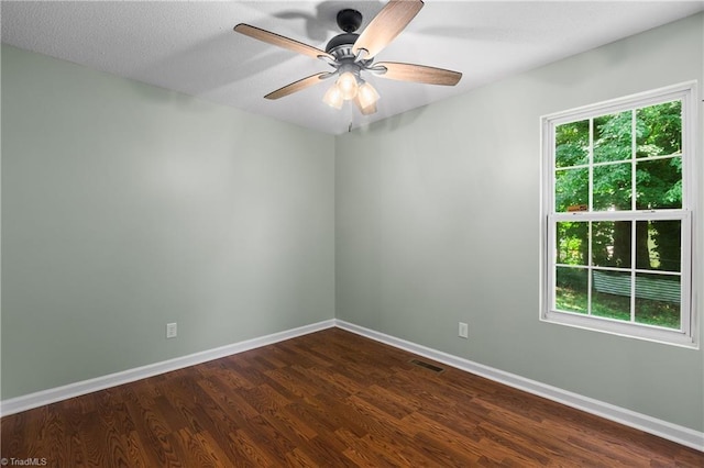 1650 Billy Dr, Winston-Salem, NC 27107 - unfurnished room featuring dark wood-type flooring and a ceiling fan