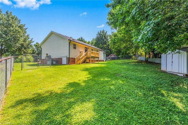 1650 Billy Dr, Winston-Salem, NC 27107 - fenced backyard with stairway, a shed, a gate, and a deck