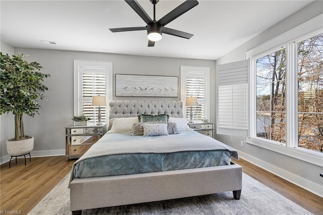 bedroom featuring ceiling fan and wood-type flooring