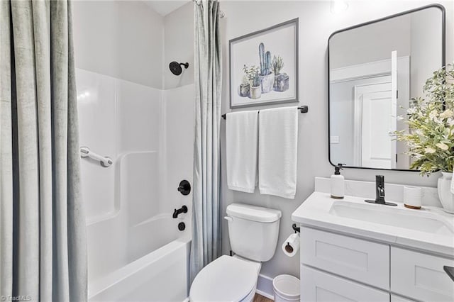 full bathroom with vanity, toilet, and shower / bath combo with shower curtain