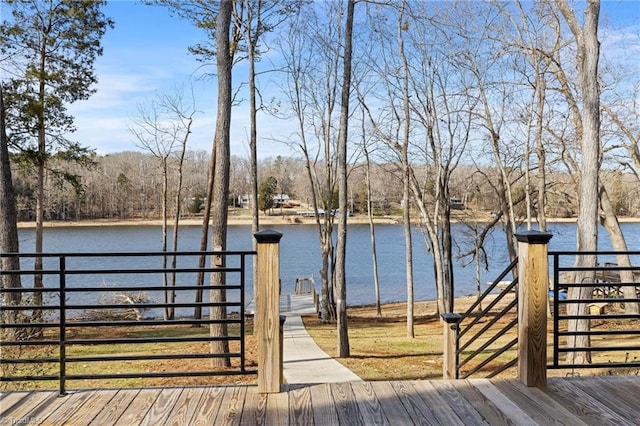 wooden deck with a water view