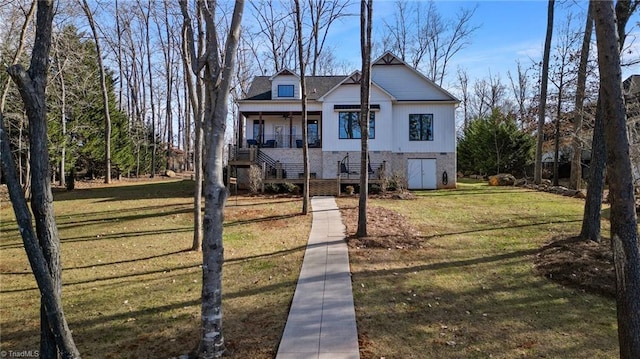 view of front of house featuring a porch and a front lawn