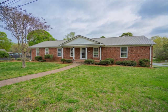 804 W 4th Ave, Lexington, NC 27292 - ranch-style house with brick siding and a front lawn