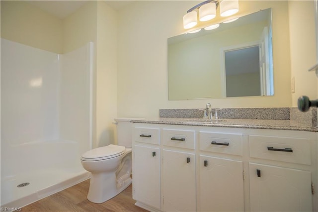 804 W 4th Ave, Lexington, NC 27292 - full bathroom with toilet, a shower, vanity, and wood finished floors
