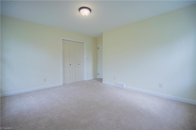 804 W 4th Ave, Lexington, NC 27292 - unfurnished room with carpet, baseboards, and visible vents