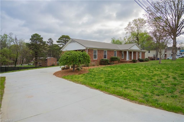 804 W 4th Ave, Lexington, NC 27292 - ranch-style home with a front yard, brick siding, and concrete driveway