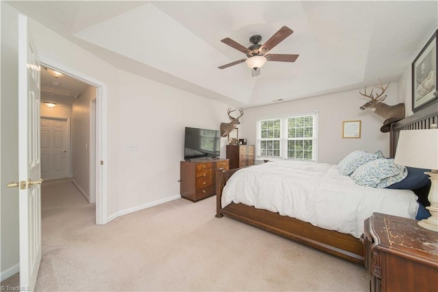 1923 Treyburn Ln, High Point, NC 27265 - bedroom featuring light colored carpet, a raised ceiling, and a ceiling fan