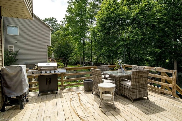 1923 Treyburn Ln, High Point, NC 27265 - deck with outdoor dining area and view of wooded area