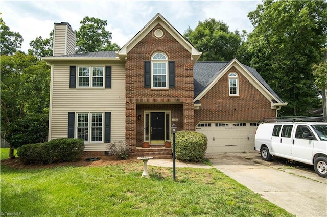 1923 Treyburn Ln, High Point, NC 27265 - view of front of home featuring concrete driveway, a chimney, a front yard, a garage, and brick siding