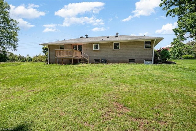 back of house with a yard