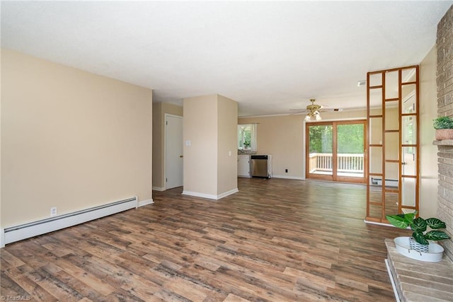 unfurnished living room featuring baseboard heating, ceiling fan, wood finished floors, and baseboards