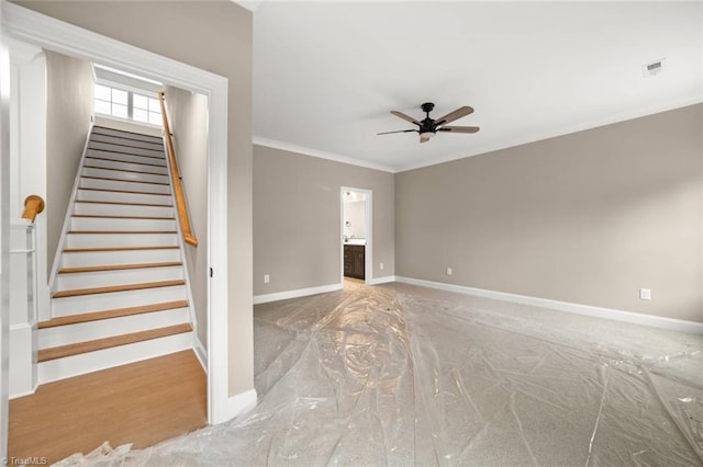 6957 Orchard Path Dr, Clemmons, NC 27012 - stairs with ceiling fan, baseboards, and ornamental molding