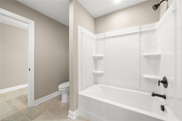 6957 Orchard Path Dr, Clemmons, NC 27012 - bathroom with toilet,  shower combination, baseboards, and tile patterned floors