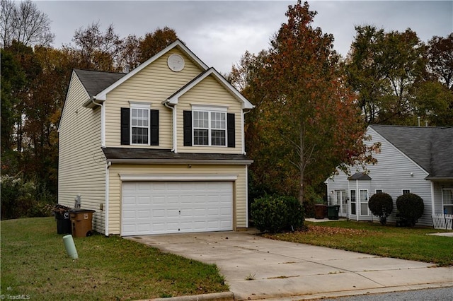 view of front facade featuring a garage and a front lawn