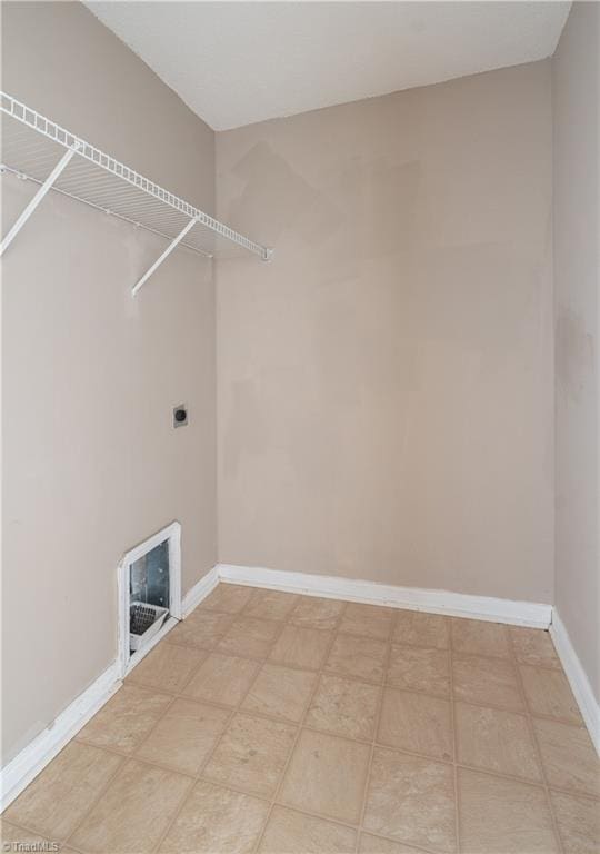 laundry room featuring hookup for an electric dryer