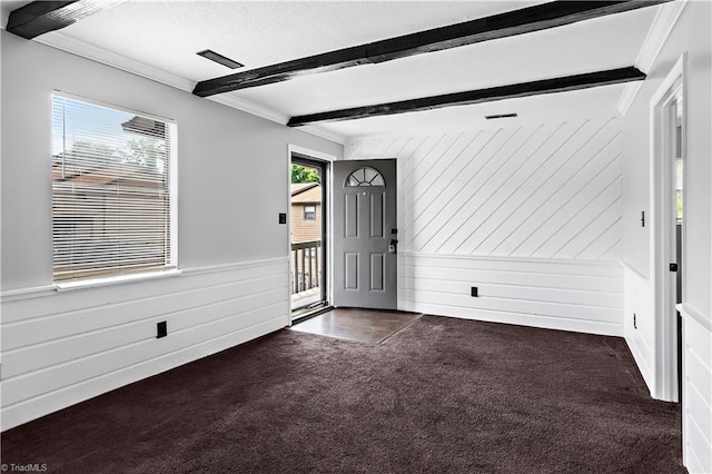 170 Vista Cir Unit C, Winston-Salem, NC 27106 - foyer featuring dark colored carpet, beamed ceiling, wood walls, crown molding, and a textured ceiling