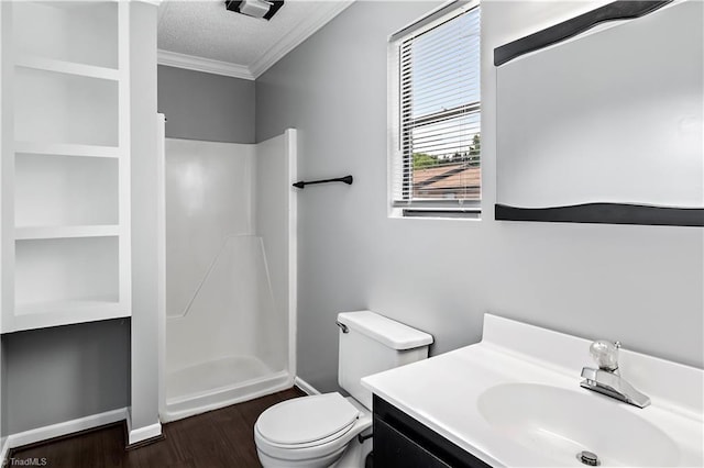 170 Vista Cir Unit C, Winston-Salem, NC 27106 - bathroom featuring crown molding, wood finished floors, a shower, vanity, and toilet