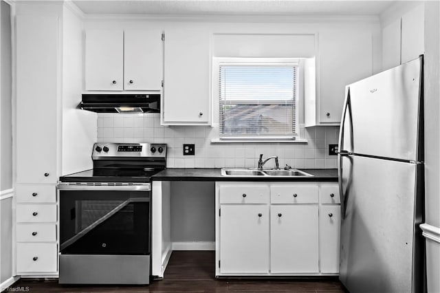 170 Vista Cir Unit C, Winston-Salem, NC 27106 - kitchen with appliances with stainless steel finishes, under cabinet range hood, a sink, and dark countertops