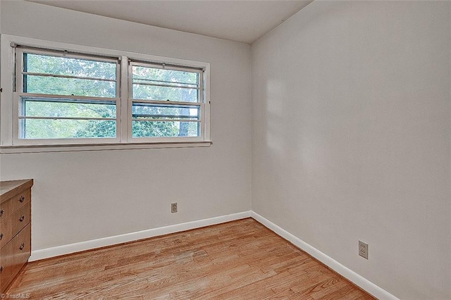 empty room with light wood-type flooring