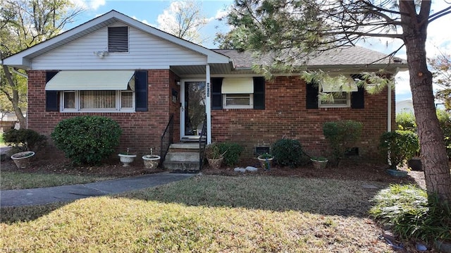 view of front of house with a front lawn